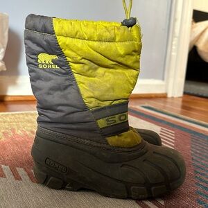 Sorel kids winter snow boots yellow size 1 some staining as photo lots of life